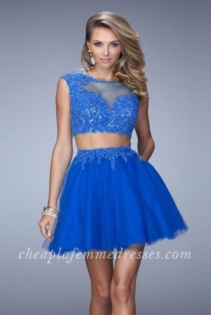 Stunning La Femme Style 21878 Homecoming Dress Features a Sheer High Neckline, Two Piece Style, Beaded Lace Appliques Crop Top and Waistband, Sheer Back, Side Pockets, and Short Tulle Skirt. This Two Piece Short Dress is Perfect for 2015 Homecoming Dress, Cocktail Dress, Party Dress, Sweet 16 Dress, Winter Formal Dress or Special Occasion Dress. Size: Standard Size or Custom Made SizeClosure: Back ZipperDetails: Two Piece, Lace Appliques, PocketsFabric: Tulle, LaceLength: ShortNeckline: High NeckWaistline: NaturalColor: Electric BlueTag: Electric Blue,Short,High Neck,Homecoming Dresses,Cocktail Dresses,La Femme 21878