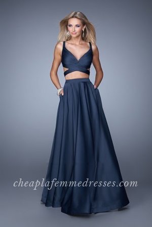 Have that fabulous look in La Femme 21178. This sassy evening gown features a crisscross ruching that frames the bust. Side cutouts give a daring appeal. The two piece set is trimmed with a full skirt that effortlessly touches the floor as you walk with grace. Perfect for 2015 Prom Dress, Holiday Dress, Winter Formal Dress, or Special Occasion Dress. Size: Standard Size or Custom Made SizeClosure: Back ZipperDetails: Two Piece, Open Back, PocketsFabric: Stretch SatinLength: LongNeckline: V-NeckWaistline: NaturalColor: NavyTag: Navy,Long,V-Neck,Prom Dresses,La Femme 21178