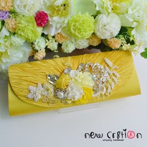 Brighttogo
Yellow clutch with fabric flowers with beaded yellow japan lace patch, crystals and embellishments 
Real Picture
#ootd #clozetteid #newcr8tion #taspesta #silver #fashion #handmade #hijabstyle #kondangan #pesta #indonesiacraft #oem #aksesoris #accessory