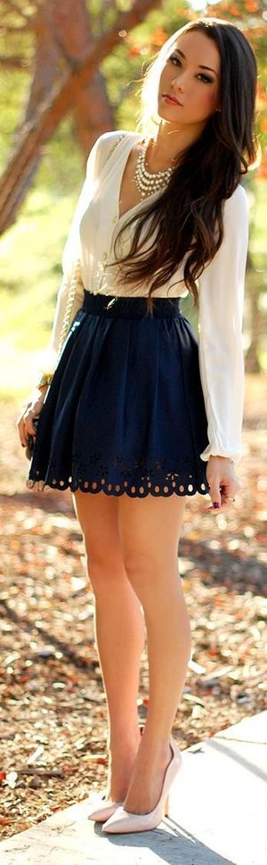 white top + black mini skirt
