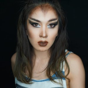 Keep the halloween mood comin' til you turn into a werewolf....Brows:Random glue stick@benefitindonesia Ka-Brow No. 5Eyes:@toofaced Chocolate Bar Palette@makeupgeekcosmetics "Corrupt"Catrice Highlighting Shadows@makeupforeverid Aqua BlackLens: Lucy Brown from @eyeslandcon Face:@marcbeauty Genius Gel Foundation from @sephoraidn RCMA No Color PowderAustralis AC-on-Tour contour kit from @hellocosmetico Lips:@rollover.reaction Moss + Triple Fudge eyeshadow from @toofaced Choc Bar Palette