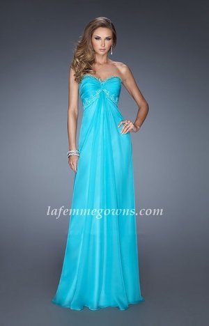 Party in style wearing this charming prom dress by La Femme 20042. The strapless sweetheart bodice is edged in sparkling tonal lace and features a chic twist for a flattering fit. From the empire waist, this full-length gown flows to the floor in elegantly draped layers creating a figure flattering and fabulous ensemble. This dress is perfect as a Homecoming Dress, Wedding Guest Dress, Prom Dress, or a Special Occasion Dress.

Size: Standard Size or Custom Made Size
Closure: Back Zipper
Details: Gathered Bodice, Jeweled Lace
Fabric: Chiffon
Length: Long
Neckline: Strapless Sweetheart
Waistline: Empire
Color: Aquamarine
Tag: Aquamarine, Long, Strapless, Prom Dresses, La Femme 20042