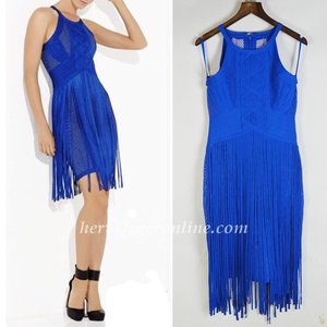 Life on the fringe has never looked so chic.

Brand: Herve Leger
Round neckline.
Sleeveless.
Plaited embellishment.
Allover fringe detail.
Concealed center back zipper with hook-and-eye closure.
Self: Rayon, Nylon, Spandex jacquard.
Contrast 1/3: Rayon, Nylon, Spandex bandage. 2: Rayon bandage.
Dry Clean Only.
Imported.
To maintain the beauty of your garment, please follow the care instructions on the attached label.
Tags: Herve Leger, Bandage Dresses, Herve Leger Dresses, Herve Leger Sleeveless Dresses