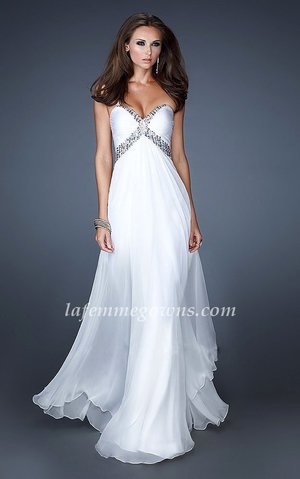  This Gorgeous La Femme Prom Dress Style 18843 Features a Sweetheart Neckline which is outlined with Beautiful Iridescent Beadwork. The back of the Dress features a Diamond like Cut Out and connecting Straps going across the Center of the Back. La Femme Dress 18843 would be a perfect Prom Dress or Pageant Dress.
 
Size: Standard Size or Custom Made Size
Closure: Zipper
Details: Criss-Cross Sequined Bodice, Open Back 
Fabric: Poly Chiffon 
Length: Floor Length
Neckline: Strapless Sweetheart 
Waistline: Empire 
Color: White
Tag: White, Sequin, Strapless, Long, Prom Dresses, La Femme 18843