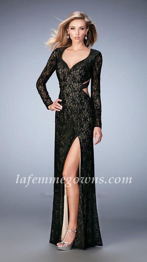  Captivating full lace gown with "V" neckline and side slit. The gown features side and back cutouts and is embellished with scattered stones. Back zipper closure. Size: Standard Size or Custom Made SizeClosure: Back ZipperDetails: Side SplitFabric: JerseyLength: LongNeckline: Two ShoulderWaistline: NaturalColor: BlackTag: Black, Long, Two Shoulder, Prom Dresses, La Femme 22289