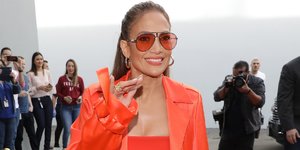 Jennifer Lopez's Head-to-Toe Neon Coral Outfit is Brighter Than My Future