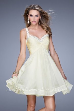 Flirty La Femme Style 20677 prom dress features a Sweetheart Neckline, Pearls and Rhinestones Neckline and Straps, Ruched Bodice, and Short Chiffon Skirt. Perfect for Prom Dress, Cocktail Dress, Party Dress, Sweet 16 Dress, Winter Formal Dress, Bridesmaid Dress or Homecoming Dress.
 
Size: Standard Size or Custom Made Size
Closure: Back Zipper
Details: Ruched Bodice, Embellished Neckline and Straps
Fabric: Chiffon 
Length: Short
Neckline: Sweetheart
Waistline: Empire
Color: Lemon
Tag: Lemon,Short,A-line,Cocktail Dresses,La Femme 20677