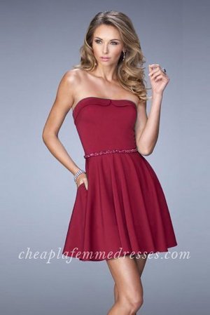 Gorgeous La Femme 22023 jersey dress with modified sweetheart neckline. Dress features thin beaded belt and skirt pockets. This Dress is Perfect for 2015 Homecoming Dress, Cocktail Dress, Party Dress, Sweet 16 Dress, Winter Formal Dress or Special Occasion Dress. Size: Standard Size or Custom Made SizeClosure: Back ZipperDetails: Beaded Belt, PocketsFabric: JerseyLength: ShortNeckline: SweetheartWaistline: NaturalColor: WineTag: Wine,Short,Sweetheart,Homecoming Dresses,Cocktail Dresses,La Femme 22023