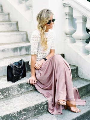 Mary Seng of Happily Grey wears a maxi skirt and a white lace top for a flirty street style look. // #StreetStyle #OutfitIdeashttp://www.whowhatwear.com/best-fashion-blogs