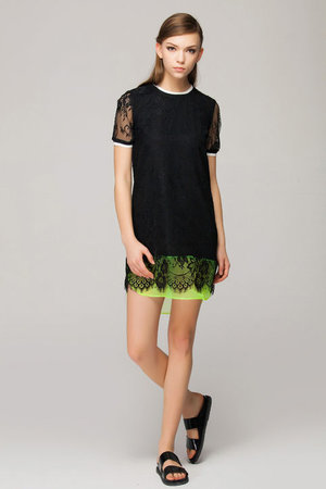 A Modern Lace DressLace is back and edgier than ever. Whether in a bright color, as a layering piece, or in a thicker cutout texture, the trend is taking a step away from its delicate nature. Rock some lace in a more casual setting in the coming year, or go classic and wear a lacy dress to a cocktail party. 