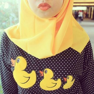 The duck lips~ hahaha---Wear playful tee and bright lipstick color to brigthen up your looks.---#orangelips #ducklips #hijab #clozetteid