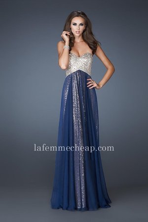 Take a shimmering long sequin strapless La Femme 18898 dress and overlay it with a luxurious layer of sheer chiffon. This stunning strapless evening gown is from the talented designers at La Femme and also features a sexy diamond cut out back that let's you show off a touch of your sassy side. This dress is perfect as a Homecoming Dress, Wedding Guest Dress, Prom Dress, or a Special Occasion Dress. Size: Standard Size or Custom Made SizeDetails: Sequined Bodice, Open BackLength: Floor LengthNeckline: Strapless Sweetheart Waistline: NaturalColor: NavyTag: Navy, Sequin, Open Back, Strapless, Long, Prom Dresses, La Femme 18898