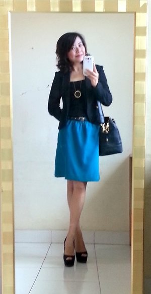 Cropped blazer with teal skirt