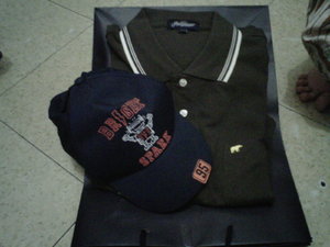 A hat for the boy and a polo shirt for the father