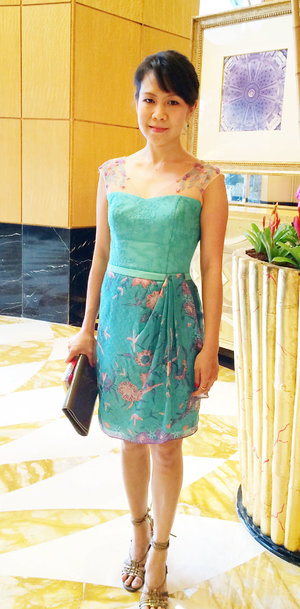 Batik dress with 3 D embroidery details. The skirt is made from batik tulis. 
