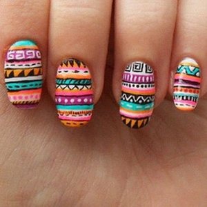 Tribal not just printed on shirt, but on nails will be better ^^