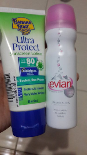 You must bring these for beach trip - sunscreen lotion and evian