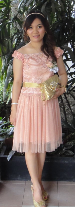 In pink n gold. The dress was made by my mom...thank u mom xoxo