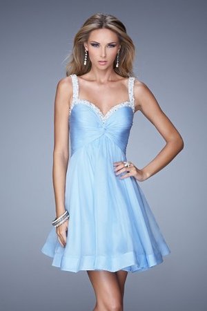 Flirty La Femme Style 20677 prom dress features a Sweetheart Neckline, Pearls and Rhinestones Neckline and Straps, Ruched Bodice, and Short Chiffon Skirt. Perfect for 2015 Prom Dress, Cocktail Dress, Party Dress, Sweet 16 Dress, Winter Formal Dress, Bridesmaid Dress or Homecoming Dress.
 
Size: Standard Size or Custom Made Size
Closure: Back Zipper
Details: Ruched Bodice, Embellished Neckline and Straps
Fabric: Chiffon 
Length: Short
Neckline: Sweetheart
Waistline: Empire
Color: Cloud Blue
Tag: Cloud Blue, Short, A-line, Cocktail Dresses, La Femme 20677