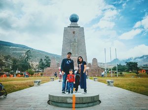 Family picture in between Northern and Southern hemispheres, Equator Line.#ecuador #equator #familypicture #clozetteid