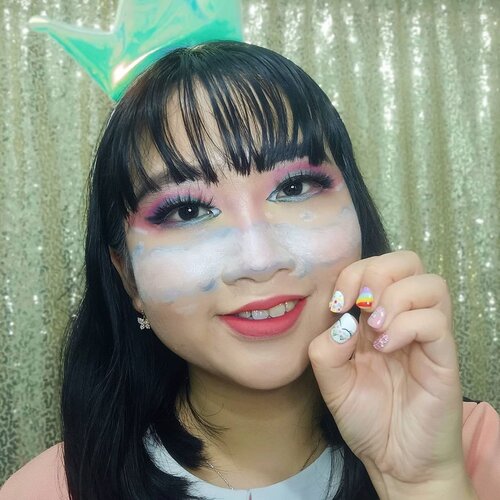 DAY 15 🦄
#30DaysMakeupWithNda
.
It's unicorn time! Kangen banget main bikin face painting lagi 😂 aku tahun 2019 rajin banget ngegambar di wajah, tahun ini gonta ganti warna eyeshadow doank. Doain ya kalo udah ada free time yg bener2 bs me time pasti nanti aku utak atik bikin face art atau face painting lagi! Sekarang, nikmati dulu foto ku tahun lalu ini 💞 .
.
So, this is my 𝐮𝐧𝐢𝐜𝐨𝐫𝐧 𝐢𝐧 𝐭𝐡𝐞 𝐬𝐤𝐲 𝐦𝐚𝐤𝐞𝐮𝐩 𝐥𝐨𝐨𝐤 💃 .

Dulu sempet post ini karena join collab nya salah satu beauty community, but skg posting lg gak apa ya? Unicorn salah satu fav aku dari tahun 2019 smpe skg pun masi suka 🦄 makanya pas ada event makeup collab temanya unicorn aku lgsung join dan coba menghias wajah! Then, this is the result ❤️ What do you think guys? Siapa disini yg suka face painting juga? Seru loh bikin art di wajah walaupun butuh waktu berjam-jam bikinnya tapi hapusnya 5 menit doank WKWK ✨.
.
Mohon maaf, abaikan poni yang lepek karena waktu itu ada deadline mengejar tapi rambut tak bersahabat HAHA 🤪 Luvvv!!! Tiba tiba abis liat kukunya, jd pengen bikin nail art lagi huhu kangen manjangin dan hiasin nih kuku 😭🥰 .
.
🦄 Λｐｒｉｌ15, 2020
.
#AforAlinda #Alindaaa29 #Alinda #ClozetteID @clozetteid @beautycollab.id
@bloggervloggersmg #30DaysMakeupWithNda #makeup #makeuplook #graduationmakeup #inspirasikecantikan #tampilcantik #beautycollabid #bloggervloggersmg #influencer #influencers #influencersemarang #endorsement #endorsementsemarang #dirumahaja #ubahinsekyurjadibersyukur #jalani_nikmati_syukuri #rezekigakketuker #VloggerSemarang #BloggerSemarang