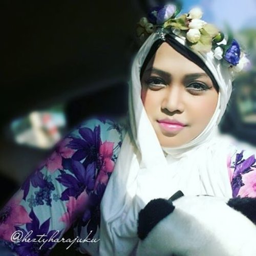 Saturday, August 29th, 2015 ---- #MuslimahTraveler Day 4 : "Mission Accomplish, Let's go home! " 💑💍💐 💐💍💑 When I hug this #Panda from my brother and her fiancee, I feel like... my mission has been accomplished... alhamdulillah! 😉 Now it's time to go home and thinking about my own life lolz. My #OOTDis #fairy in #modestfashion #coveredstyle . I wear a simply #flowerpattern long dress, I bought this at Bringhardjo Market #Yogya... A simply white #instantheadscarf and my #handmade #flowercrown. Tattaraaaa!!... 🌸🌹🌻🌼#scarf #headscarf #traveling #trip #Indonesia #stylishtraveler #travelgrammer #ClozetteID #hijabstyle #kerudunginstan #hijabi #hijabista #MuslimahIndonesia #HijabIndonesia