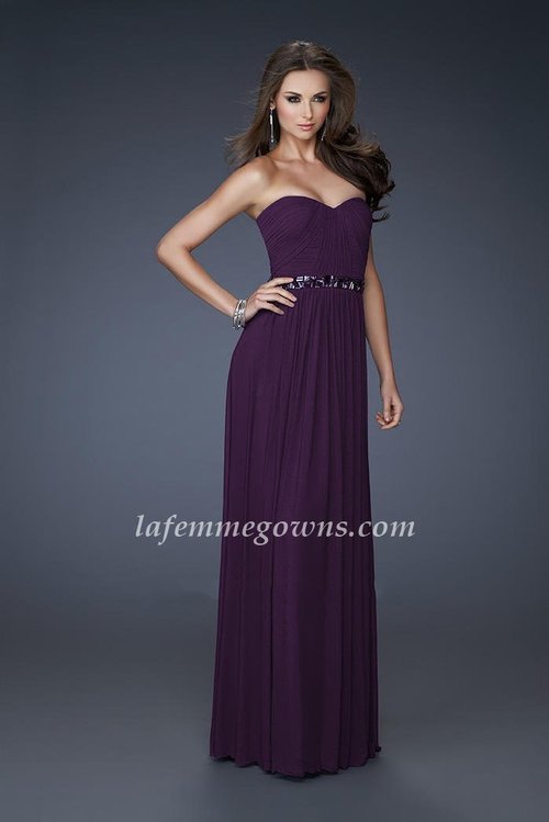  This Net dress is long and flowing in majestic purple and Majestic Purple colors. It is a long, elegant tube-like dress that comes in a variety of sizes to flatter any silhouette. This dress would be just perfect to wear to a prom, formal event or ball. The sweetheart neckline is ever so feminine. When you wear the net dress to a fancy event, you convey the message that you are beautiful, elegant and feminine. 
 
Size: Standard Size or Custom Made Size
Closure: Side Zipper
Details: Straight Across, Lightweight Skirt
Fabric: Net
Length: Floor Length
Neckline: Strapless Sweetheart 
Waistline: Empire Waist
Color: Majestic Purple
Tag: Majestic Purple, Strapless, Long, Homecoming Dress, La Femme 18257