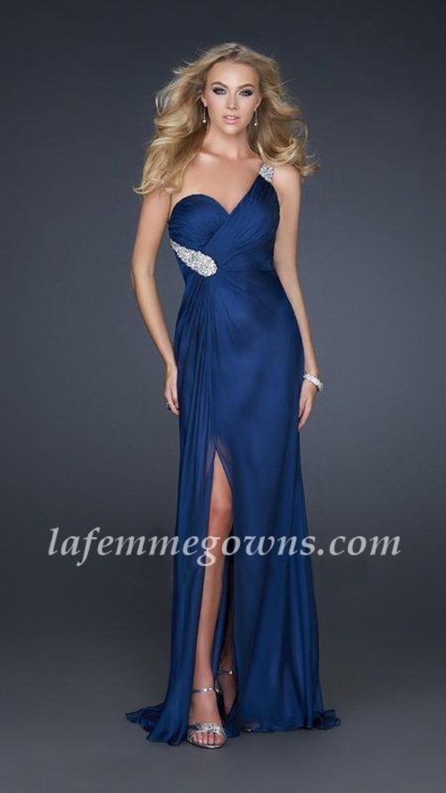  Channel true luxury in this evening gown from formalwear brand La Femme 17157. This brilliant evening frock is made for those who love drama. This gown has an asymmetrical neckline and an embellished strap at one shoulder. The bust is sculpted with a sweetheart neckline and light ruching adds texture. A cluster of stones sits at one side of the bodice and the flowing skirt has an A-line shape and slit at one leg.
 
Size: Standard Size or Custom Made Size
Closure: Side Zipper
Details: Ruched Bodice, Beaded
Fabric: Chiffon 
Length: Long
Neckline: One Shoulder
Waist: Natural
Color: Navy
Tag: Navy, Halter, Prom Dresses, La Femme 17157