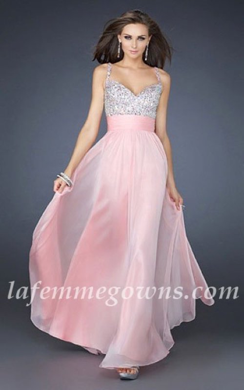  This gorgeous jeweled encrusted Dress Featuring Thin Straps, The beautiful heart-shaped bodice is encrusted with jewels, and a gorgeous chiffon A-line skirt finishes the look. If pink, Pink, is not your color, the dress is also available in several other colors. This is just the dress for the girl who wants to look sensational at prom. This is the perfect prom or special occasion dress that will be sure to get you noticed! Ensure your special night will be one you'll never forget. 
 
 
Size: Standard Size or Custom Made Size
Closure: Zipper
Details: Jewel Encrusted Bodice, Layered Skirt, A-Line skirt
Fabric: Chiffon 
Length: Floor Length
Neckline: Heart-Shape, Slim Straps
Waistline: Empire Waist
Color: Pink
Tag: Sequin, A-line, Thin Straps, Pink, Long, Prom Dresses, La Femme 16802