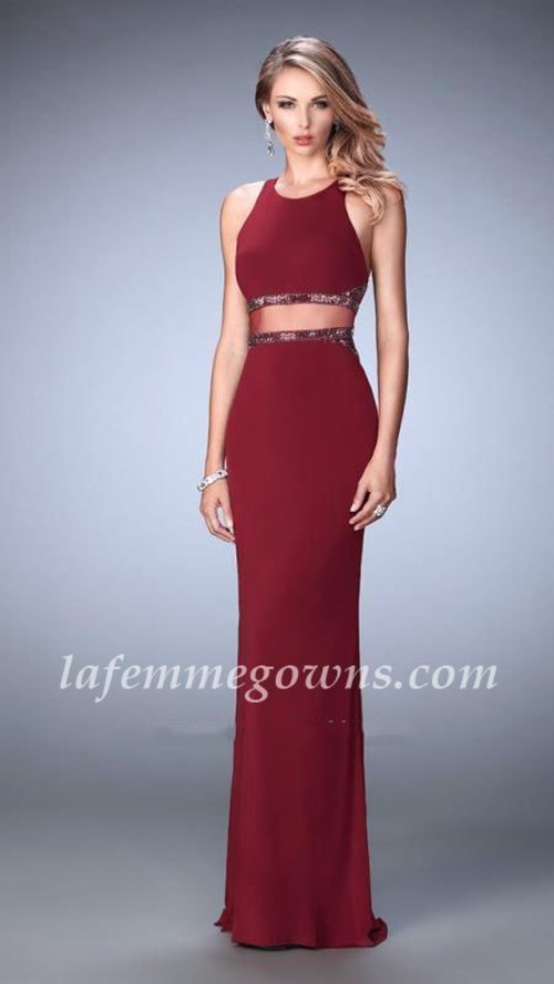  Captivating jersey faux two piece gown with a sheer paneled back. The waistband and bodice are trimmed with charocoal beading. Back zipper closures. Size: Standard Size or Custom Made SizeClosure: Back ZipperDetails: SequinFabric: JerseyLength: LongNeckline: Two ShoulderWaistline: NaturalColor: GarnetTag: Garnet, Long, Two Shoulder, Prom Dresses, La Femme 22272