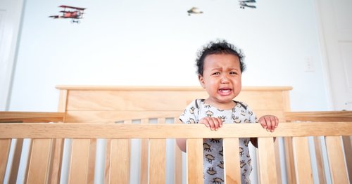 If Your Baby Wakes Up Crying Hysterically, You're Not Alone — Here's What May Be Going On