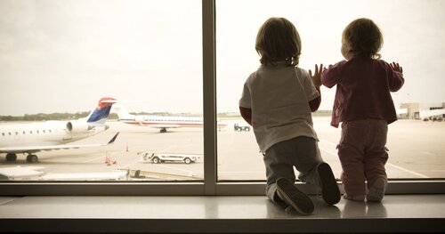 Thinking About Flying With Kids? Here's What to Consider Before You Book That Flight