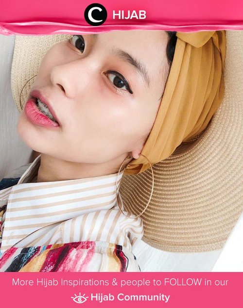 Clozette Ambassador @rimasuwarjono and her accessories:round hat and hoop earrings. Simak inspirasi gaya Hijab dari para Clozetters hari ini di Hijab Community. Yuk, share juga gaya hijab andalan kamu.