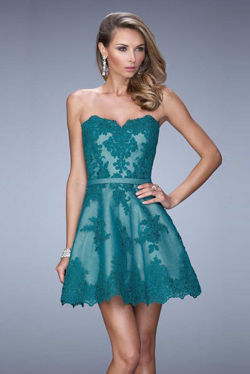 Stunning lace sweetheart neckline dress with unique patterned embroidery. Waistline features a thin belt with a lace overlay. Back zipper closure. Size: Standard Size or Custom Made SizeClosure: Back ZipperDetails: Lace OverlayFabric: LaceLength: ShortNeckline: SweetheartWaistline: NaturalColor: EvergreenTag: Evergreen, Short, Sweetheart, Homecoming Dresses, La Femme 22046