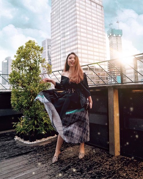 It was pouring when I took this shot, but with the view of Jakarta’s skyscrapers, I just couldn’t resist. 🏙✨—Black Top from @viorellabel Multicolor Pleat Skirt from @kenwin_shop Snakeskin Heels from @meijibeyondfashion —📸 @cindy.octaviany #PriStyleDiaries..........#whatiwore #chic #city #edgy #womensfashion #fashionistas #portrait #travelblogger #ootdinspiration #lotd #fashionblog #bloggerstyle #fashion #wiwt #styleinspo #instastyle #blogger #ootd #styleblogger #blogger #fashionblogger #outfitoftheday #fashioninfluencer #streetstyle #skyscraper #style #outfit #clozetteid