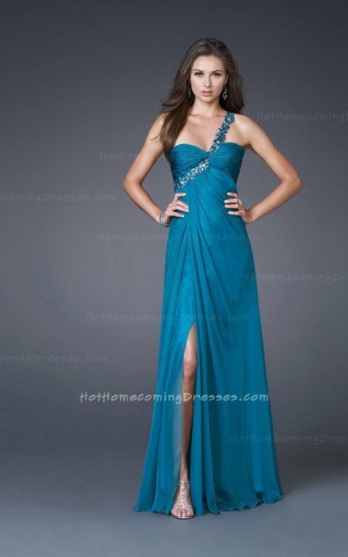 This formal one shoulder Dress features a beaded strap, flowing silhouette, and high side front slit.A beaded one shoulder strap gives this long dress in Teal a touch of sparkle and the low cut back and side slit on the flowing skirt adds to the drama. .Formal dresses run two sizes smaller than regular sizes! Compare to the size chart for a proper fit, and provide your measurements with your order.

Size: Standard Size or Custom Made Size
Closure: Low Back Zipper
Details: Beaded Strap, High Side Front Slit, Rouched Bust, Sleeveless
Fabric: Chiffon 
Length: Floor Length
Neckline: One Shoulder
Waistline: Empire Waist
Color: Teal
Tag: One Shoulder Strap, Teal, Floor Length, Homecoming Dresses