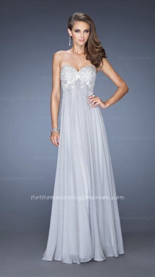 A Line Gray Formal Strapless Chiffon Prom Gown by La Femme Style 20057Empire waist chiffon gown with a sweetheart neckline. Bodice is covered with a colored lace that is embellished with small jewels. Back zipper closure.