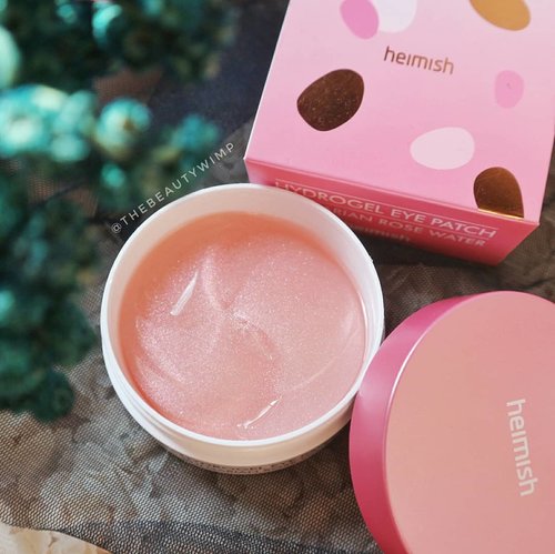 Most of the first impressions i get on this product is ; " tak pikir panganan tadi " lol which is actually understandable as it looks like piles of jelly in a glance.@heimish_korea HEIMISH HYDROGEL EYE PATCH comes in pinky glittery gel patches soaked in serum/essence solutions which are vvvery convinient and easy to use (sekali pake - buang).I've given them a try for like 2 weeks or so, and so far so good. This product is PARABEN, SILICON, and ALCOHOL FREE.As someone who has fine lines problem,I love how it contains Adenosine and Niacinamide as anti aging properties. And for those who want to brighten under eye area, Niacinamide also works as good for brigthening. Not to mention, it also has Centella Asiatica as their star ingredient.On a side note though, it contains fragrance.I honestly would suggest this product for those who often wake up in the am with major puffy eyes, bcs the patches give your eyes area that cooling and soothing sensation. For me personally, my major prob is fine lines and on this case these eye patches give my under eye area extra hydration. But cant say much about it, as reducing fine lines is not just within weeks. This product is also claimed as multi-functional patches, hence i often use it on my smile lines lol hoping its going to help abit.Once on, they do adhere to the skin nicely and do not fall off. Conclusion? Im so enjoying this product as it makes me look more awake and my under eye area feels so supple.Where to buy :@ivabeaute.idThanks heaps mba for the opporunity! ❤