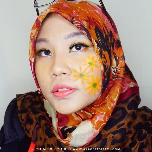 #MakeupLookbyTami kali ini tentang #SummerMakeup lagi nih tapi versi face painting~♡.Products I Used👇🌞 @catrice.cosmetics HD Liquid Foundation 040 Warm Beige🌞 @altheakorea Flawless Creamy Concealer shade Mocha 🌞 @riveracosmetics Eyebrow Matic shade Brown🌞 Okalan Take Me Home🌞 @wardahbeauty Eyeliner🌞 @meisabulumata Lucy🌞 @wardahbeauty Mascara🌞 @cathydollindonesia Duo Cushion Matte Blusher 04 Orange🌞 @ltpro_official Shade &Tint Kit 🌞 @altheakorea Petal Velvet Powder 🌞 @maybelline The Powder Mattes shade Touch of Nude🌞 @lorealindonesia Infallible Paints shade 320🌞 @viva.cosmetics Body Painting Yellow, Red, Green.#Beautiesquad #BeautygoersID #kbbvfeatured #RangerRatjun #BeautyRangerID #beautybloggerindonesia #pkubeautyblogger #indobeautysquad #bloggerceria #JBBFeatured #beautysecretsquad #indonesiabeautyblogger #HijabersBeautyBVlogger #bloggirlsid #setterspace #bloggerperempuan #bloggermafia #clozetteid