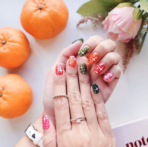 Still in the #CNY vibes with my CNY #nailart that isn’t the usual oriental design because I like something new and fresh ! Here’s my kirakira inspired nails with the colorful jelly nail polish that was a huge thing back in the 90’s done beautifully by @thefioribeautybar ❣️.....#clozetteid #flatlay #style #design #pink #beauty #tampilcantik #exploretocreate #love #sonyforher #collabwithstevie