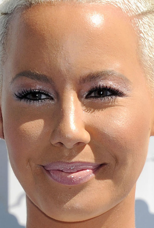 Amber Rose , the blonde, pale pink shadow and lipstick combo.