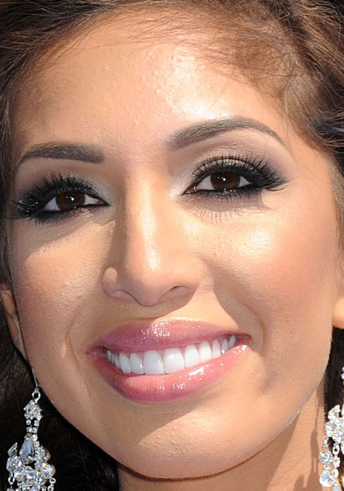 Farrah Abraham would make an excellent candidate for a make-under. She has nice features underneath the brows, drugstore false lashes and super-dated smoky eyeshadow application. |http://beautyeditor.ca/2015/04/14/mtv-movie-awards-2015|