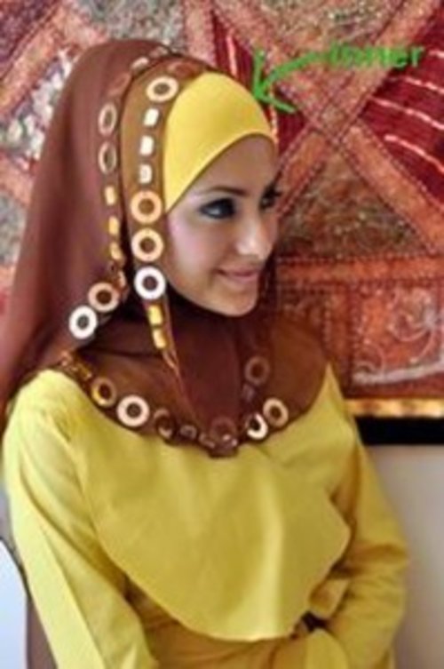 If you have a long/rectangular face shape, then avoid hijab styles that that cling tightly around your face because it will make the rectangular face look longer . Instead try putting the underscrap down on your forehead- by doing so your face will look shorter. Pay more attention on exposing your cheekbones and always wear a hijab that has volume and ruffles such as shown in the picture:#HijabMakeup