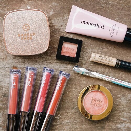 Current makeup routine using:- moonshot_idn multi protection tinted moisture : Warnanya pink dan teksturnya light. Bisa buat base sebelum makeup or dipake sendiri. Tone up your skin tone.- Nakeupface one night cushion : Cushion yang bisa dipake semaleman, bahkan buat tidur! Coveragenya mantul dan packagingnya cakep berglitter.- The Saem tip concealer : Penting dan ok bingits untuk menutupi dosa dosa di wajah hahaha.- Benefit goof proof : Untuk alis yang lebih indah wkwk.- Missha triple eyeshadow : Selalu bawa ini apalagi pas traveling karena kecil dan udah ada 3 warna isinya. Warnanya cakep cakep.- Milani baked blush : Ku pake yang shade luminoso. Favorit masyarakat.- Looke Cosmetics holy lip cream & luna lip polish : Versatile banget bisa untuk eyeshadow, blush, dan lip cream. Uhwaw~ Kalau lagi lupa bawa eyeshadow sering pake ini. Favoritku shade hebe ditop pakai lip polishnya.