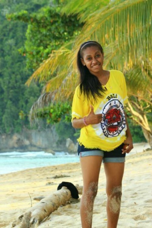 sweet papuan girl on the beach in Sorong