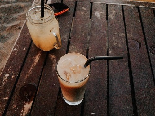 Nothing better than ice coffee and someone to share with.
.
.
.
.
.
.
.
.
#clozetteid #listenindadailyjournal
#travelphotography #photography #surabayafoodblogger #bloggerperempuan  #cullinaryreview #shortstories  #foodblogger #foodporn #foodies #surabayafoodies #coffee #coffeetable