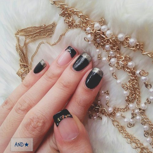 Simply black and gold nails