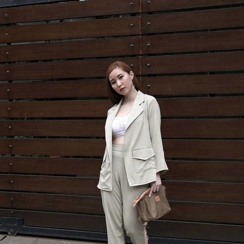 More earthy tone vibes. Suited up for the weekend wearing @tgifashion_id Alexa set in khaki paired with my favourite bralette, @loiree.id Hoop Earring and @welkinandspine Travelling dopp kit. Photo taken by @samseite using #NikonJ5 18.5mm lens, the one who made our house fence looks insta worthy 😉 #whatiwore #clozetteid #OOTD