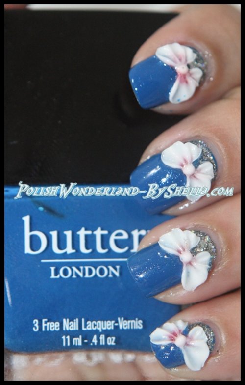 Butter London Blagger. first i used a glitter polish on the bottom of my nail then i added some nail decal to make it look prettier 