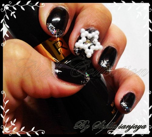 simple black nails with silver glitter and big star